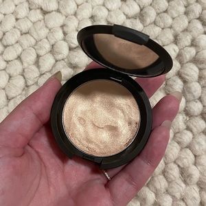 Limited BECCA Champagne Pop Cream Highlighter